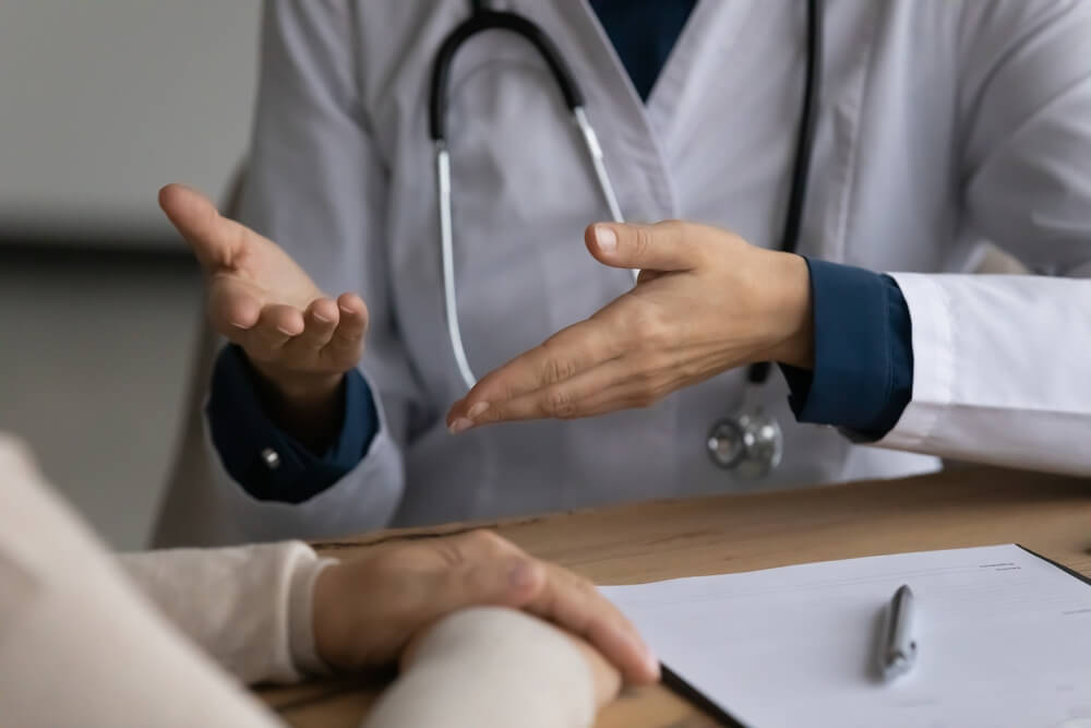 A doctor speaking with a patient. Learn more about dilaudid effects and the risk of addiction, as well as treatment options, here.