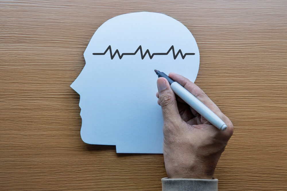A graphic of a head, suggesting mental health. Learn more about how opioids work here.