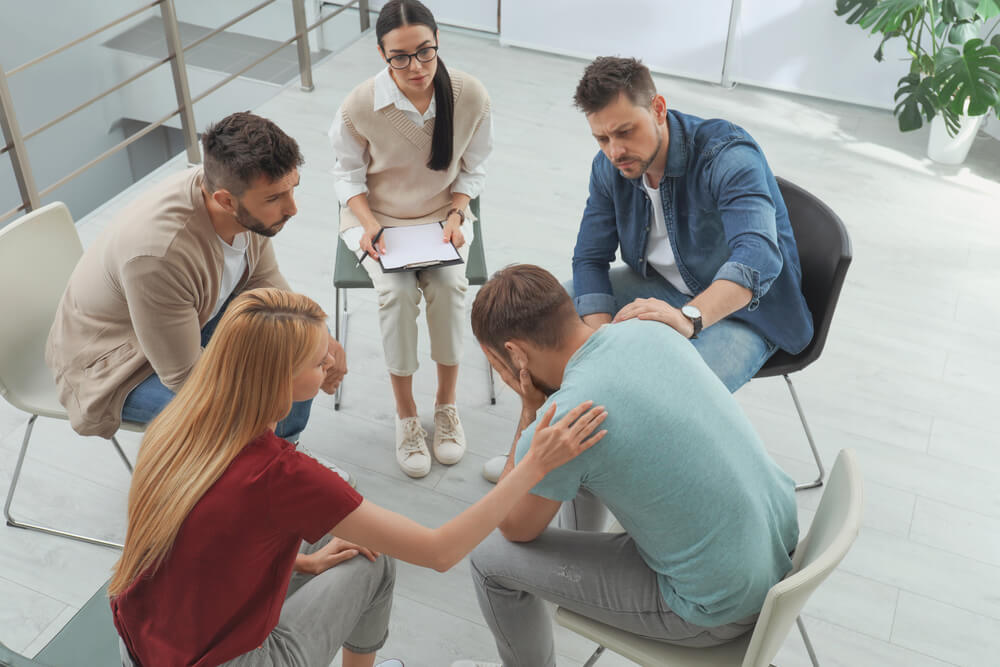 People hosting an intervention for their friend. Learn more about interventions here.