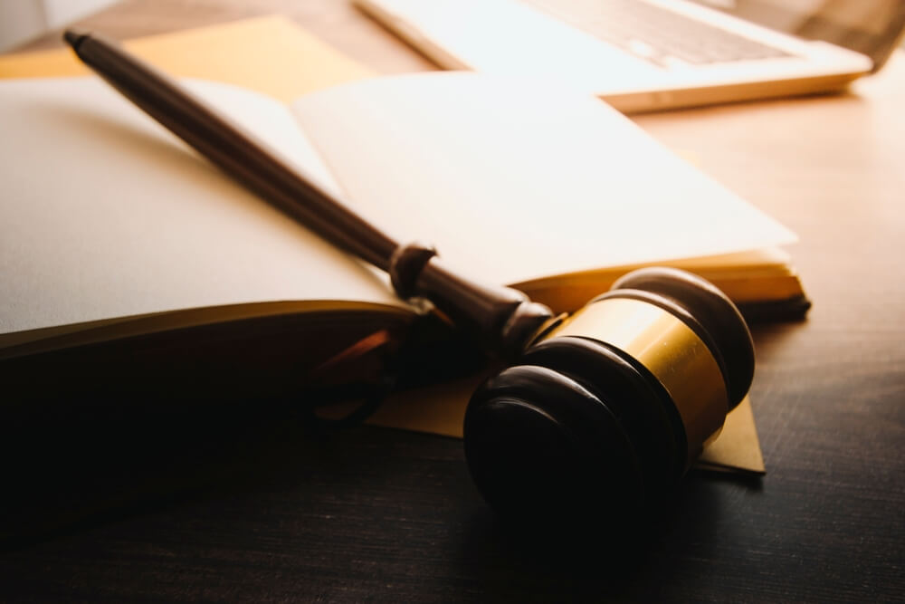 A gavel sitting atop a lawbook. Learn more about the Schedule 4 narcotics list here.