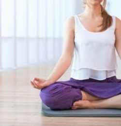 woman in seated yoga position